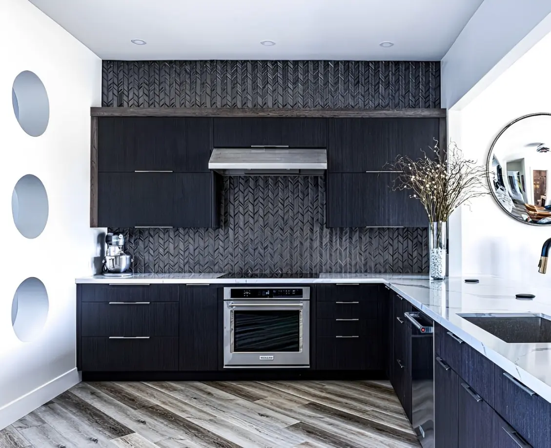 New Project (1) Modern kitchen with dark cabinets and backsplash.